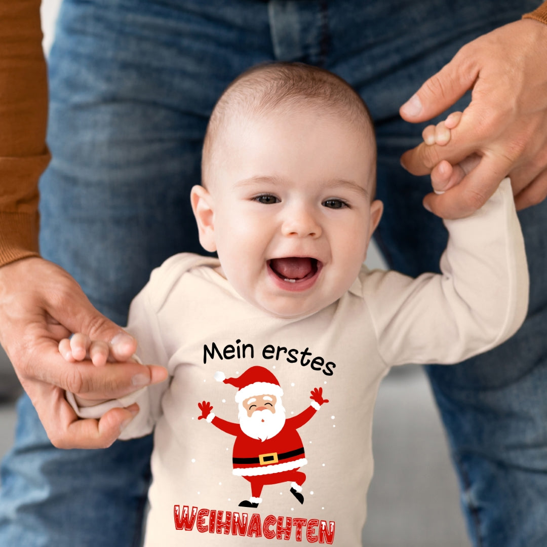 Mein erstes Weihnachten, fröhlicher Weihnachtsmann und tanzende Schneeflocken